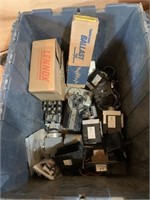 Plastic tote full of electrical breakers and more