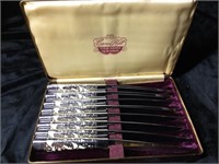 Carvel Hall steak knives.  Silver with ivory