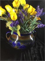 Decorative planter with artificial flowers