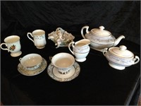 Tea set with miscellaneous tea cups and