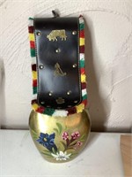 Cowbell with hand-painted flowers and handle