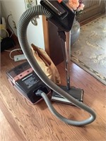 Eureka Express canister vacuum with accessories