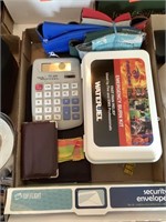Calculator, envelopes, emergency burn kit