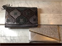 2 clutches, great condition, black has storage,