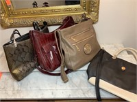 4 purses, no specific brands, all in excellent