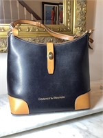 Dooney & Bourke purse, brand new. Great shape