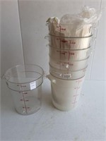 (7) 4 L MEASURING CONTAINERS