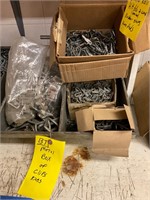Metal box of clips and rings