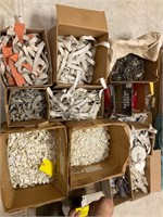 Pallet of misc plastic clips and material