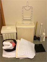 Assortment of hampers, plungers, rugs, scale