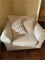 OVER STUFFED CHAIR SHOWS SOME WEAR
