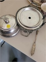 possibly silver dish with lid & peacock on bottom