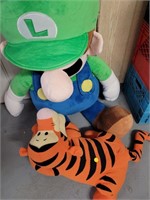 Luigi stuffed toy and tigger