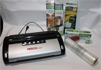 Food saver vacuum sealer with bags POWERS ON