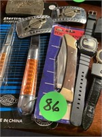 MISC LOT OF KNIVES AND WATCHES