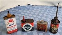 4 assorted oil cans