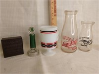 Candy container, 2 milk bottles, mootmans cup, tin