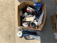 Box of plumbing and supplies