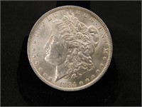 1884-O Morgan Silver Dollar;