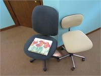 (2)Adjustable office chairs, wall décor.