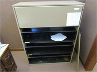 Metal file cabinet.