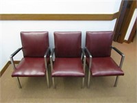 (3)Burgundy office chairs.