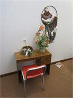 Desk, chair, décor, wall hanging.