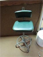 Green office stool.