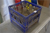 9 Milk Bottles in Blue Crate