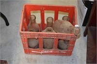 (7) Milk Bottles in Red Crate