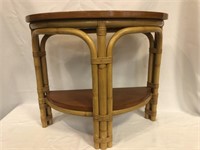 Demilune ratan side table 22” x 26” x 11”