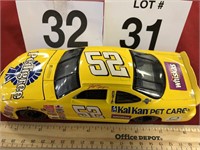 Die-cast racing cars in car #52