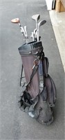 Golf clubs and bag.  Bag stand needs help.  Good