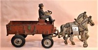 Original cast iron horse & wagon marked made in