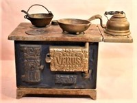 Child's Venus cook stove, cast iron & tin 8 1/2”