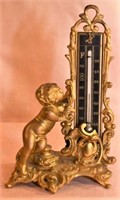 Spelter figural cherub thermometer 7” height