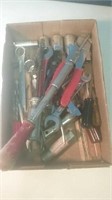 Flat full of a variety of hand tools some s