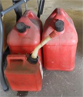 Lot #4085 - (2) five gallon gas cans and (1)