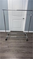 Metal clothes rack on wheels with adjustable
