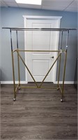 Double sided metal clothes rack on wheels
With