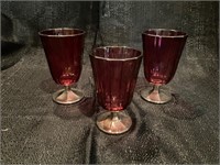 Three Cranberry Glass Water Goblets