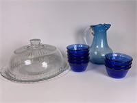 Glass cake saver, blue pitcher & Pyrex cups