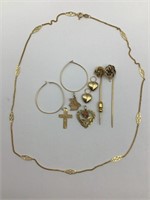 Grouping of gold jewelry items