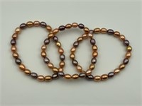Honora lot of three pearl bracelets