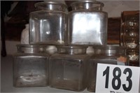 Five Glass Canisters