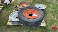 Pallet with misc. rims and one tire with rim