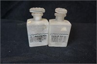 Two Apothecary Glass Bottles