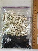 Two bags of black and white Legos