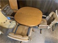 Kitchen table w/3 rolling chairs
