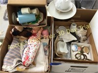 box of doll clothes and supplies